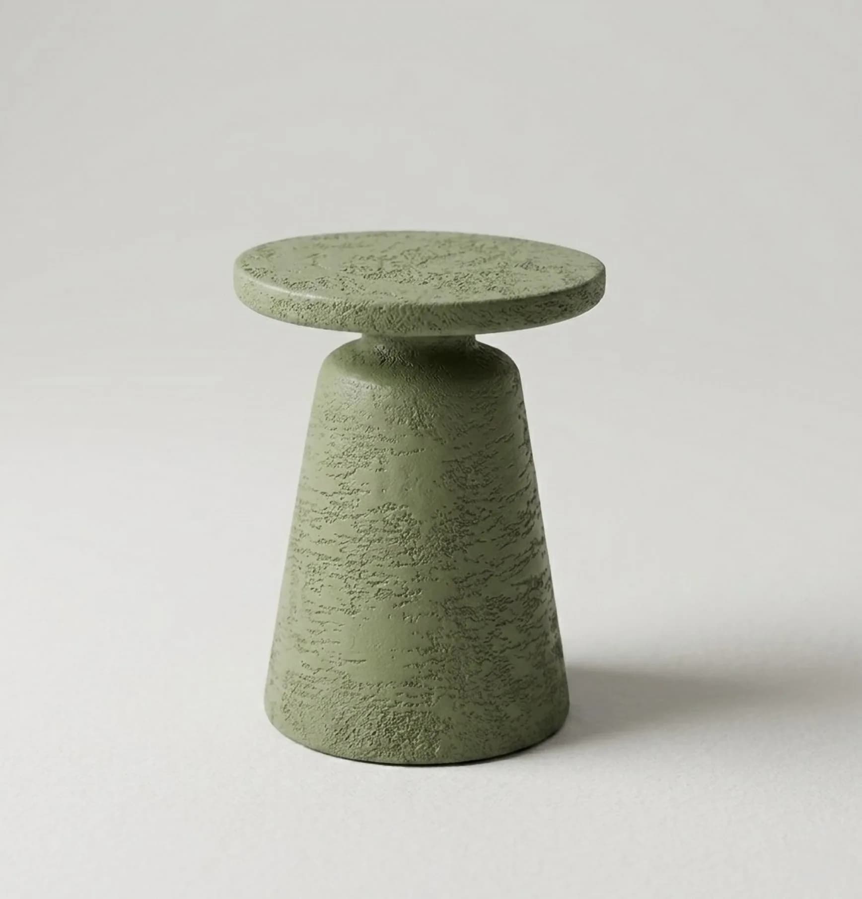 Olea side table in olive, studio photograph on a white background