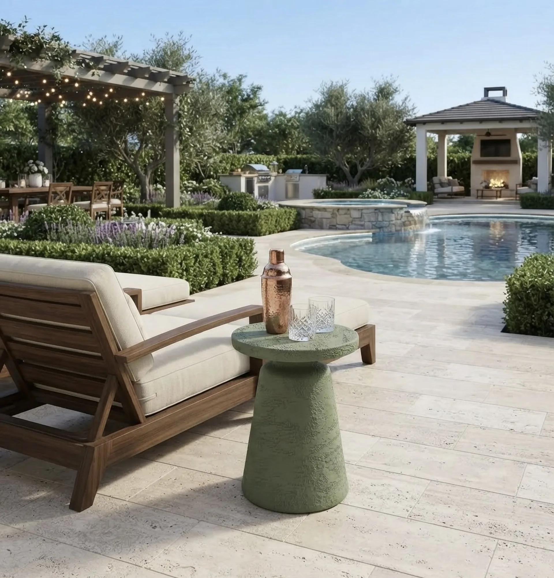 Olea beside a teak lounger at the edge of a pool, under a pergola